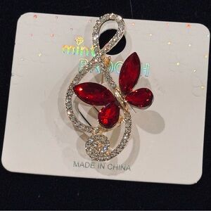 NWT Mint Gold-Tone Treble Clef Brooch with Red Crystal Butterfly Accent